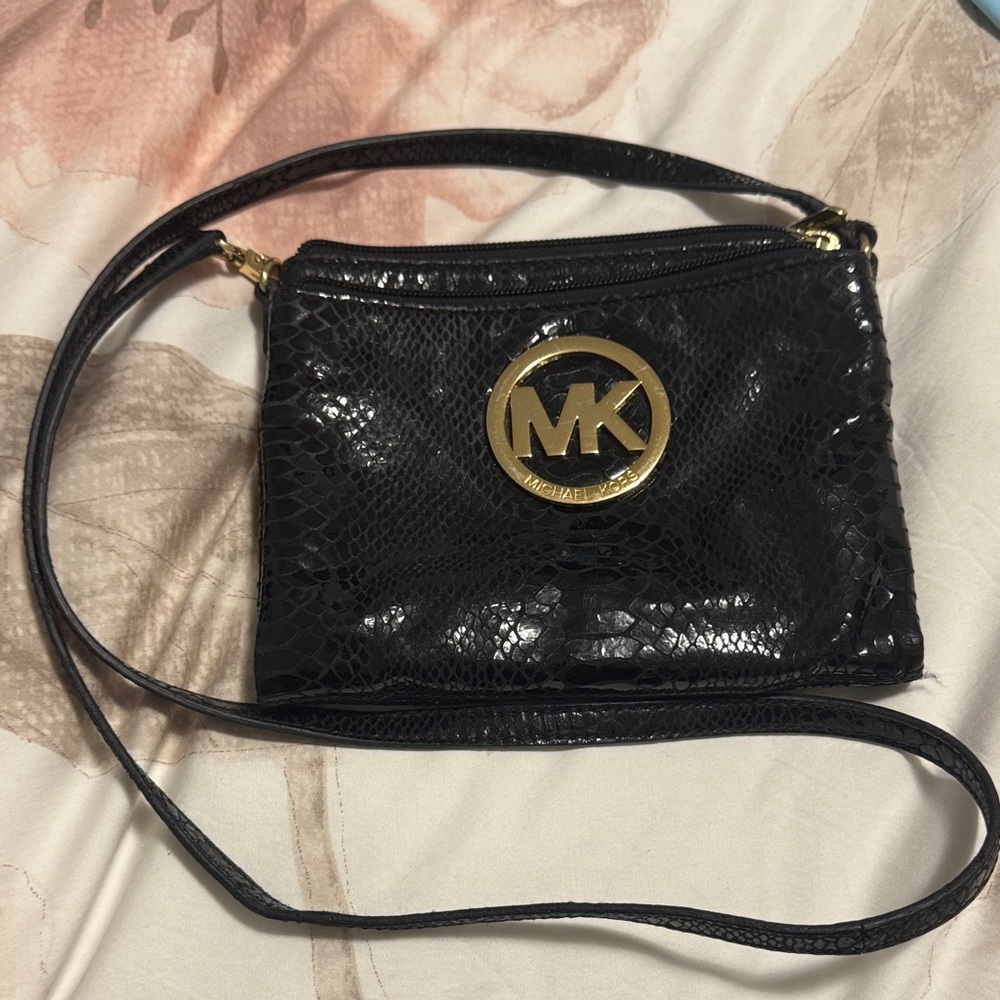Michael Kors Black shiny leather snake skin cross body purse gold hardware